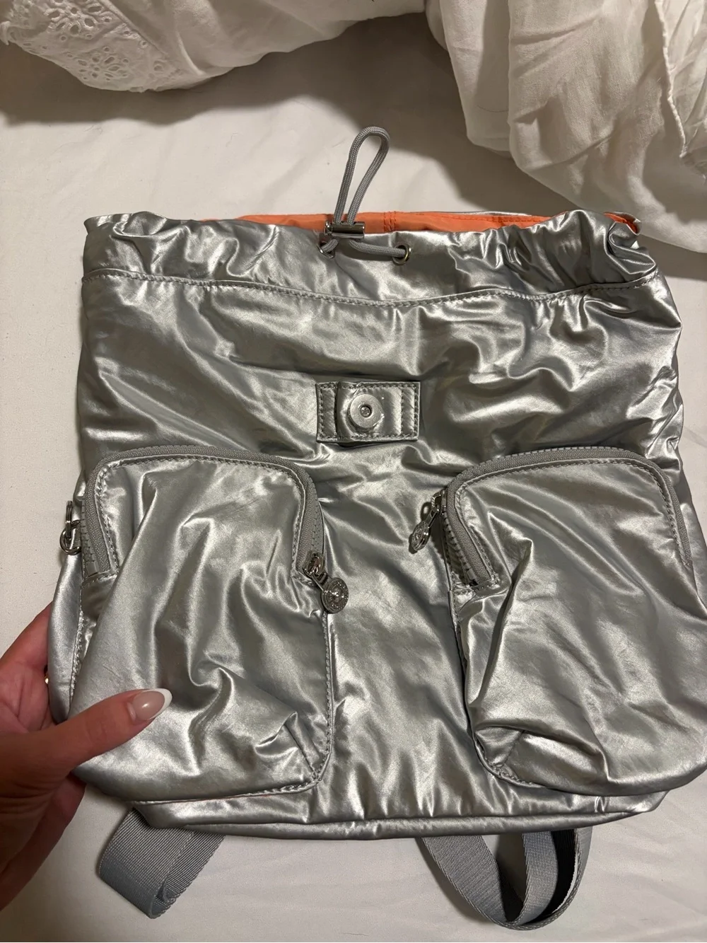 Kipling Silver Metallic Backpack with Orange lining Accent
